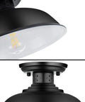 Close-up of a black metal semi flush mount ceiling light with an E26 base, part of a 2 Pack Semi Flush Mount Ceiling Light Fixtures Farmhouse Black Industrial Metal Cage Kitchen Hallway Entryway Bedroom Laundry Lights With E26 Base 13 Inch Wide Bulbs Not Included.
