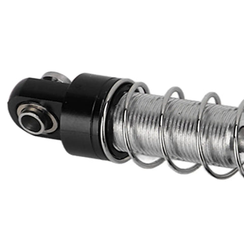 Close-up of adjustable oil shock absorber from 4-piece metal black shocks upgrade kit for 1/18 1/16 RC crawlers