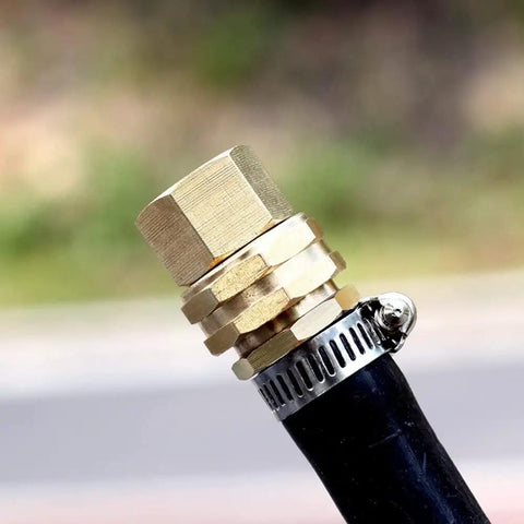 Beefy 3/4 FHT to 1/2 MIP Brass Hose Adapter shown connected to a garden hose, showcasing the leak-free connection and solid brass build.