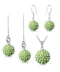 Green crystal rhinestone bead jewelry set with necklace and earrings, featuring disco ball beads for Shamballa jewelry making projects.