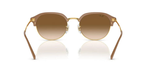Front view of RB4429 Dope Round Sunglasses With Beige On Gold Frame And Clear Gradient Brown Lenses, 53mm UV Protection.