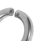 Close-up of a stainless steel spring lock washer, part of the Stainless Steel Spring Lock Washers Set That Keeps Things Tight And Secure, 200 Pack