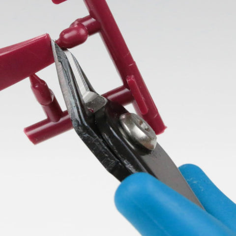 All Purpose Model Nipper PN-125 For Plastic Models cutting a plastic sprue, beginner friendly cutter in action