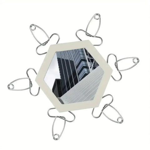 Heavy Duty Stainless Steel Spring Clamps Kit With Adjustable Plier For 0 To 2 Inch Projects Perfect For Wood Trim, Moldings And DIY Picture Frames That Are Totally Cool And Super Easy To Use. Stainless steel spring clamps holding a hexagonal frame