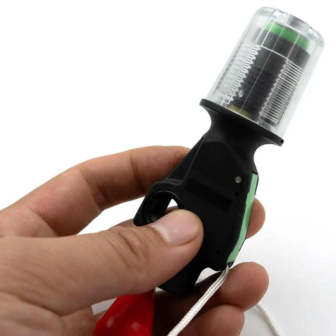 Portable Automatic Inflator For Life Jackets And Vests, CO2 Kit Compatible Half Inch Thread, held in hand, black casing.