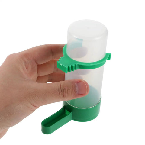No Mess 4 Pack Automatic Bird Water Feeder And Food Dispenser Clip On Cage Hydration Kit For Parrots Parakeets Cockatiels Budgies easy clean hand holding green clip design water dispenser.