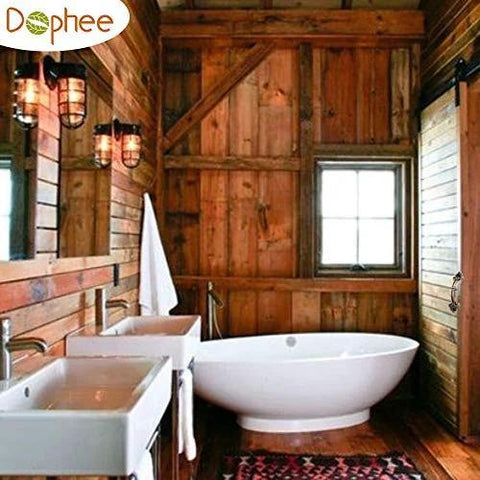 Rustic wooden bathroom with freestanding oval bathtub, dual sinks, and natural light from a window.