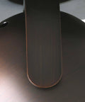 Close-up of urban bronze finish on Dope Three-Light Track Ceiling Light And Wall Sconce Kit with roundback track head detail.