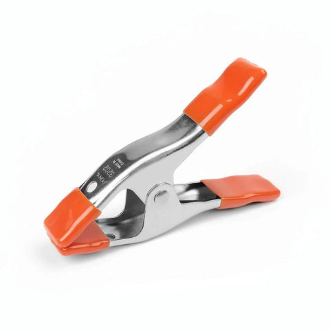 PONY 6-inch heavy-duty spring clamp with nickel-plated steel body and orange rubber handles.