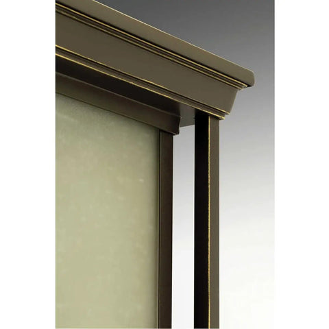 Close-up of Endicott Collection 1-Light Outdoor Wall Lantern in Antique Bronze frame with etched umber linen glass.