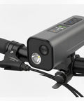 4K Bike Camera With GPS Tracking And Integrated Cycling Computer Headlight mounted on a bicycle handlebar, front view
