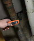 Person using IR07 Dual Infrared And Probe Pocket Size LCD Digital Thermometer With 8 To 1 Distance To Spot Wide Minus 40F To 752F Range Handy On The Go Temp Meter For Quick Accurate Readings In Cooking HVAC Automotive And More on pipes