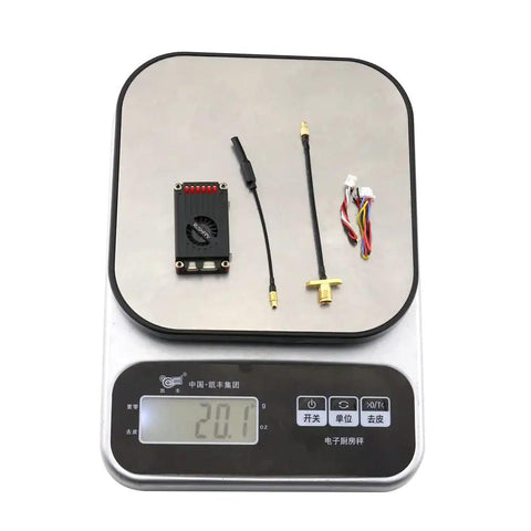 Beefy Two Point Five Watt FPV Transmitter Five Point Eight GHz Long Range For RC Drones components on a digital scale