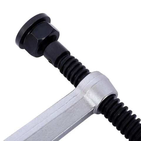 Close-up of the spindle and screw mechanism of the Heavy Duty 12 Inch F Clamp With Drop Forged Arm And Black Oxide Spindle For Woodworking Welding Metalworking DIY Projects With Quick Twist Pads That Hold Strong.