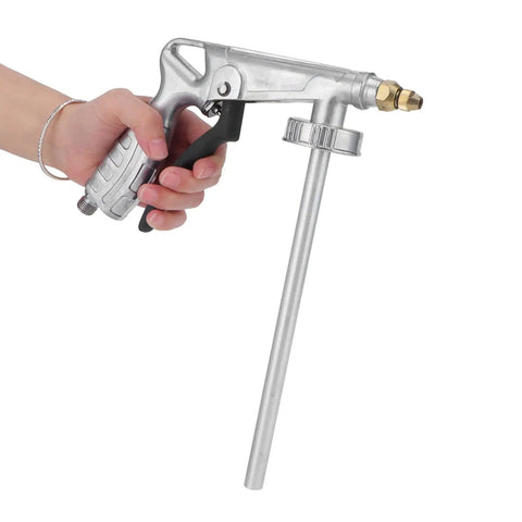 Zerodis High Volume Airless Paint Spray Gun For Wall And Furniture Coating held in hand, showcasing aluminum body and trigger design.