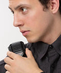 Person using Remote Speaker Microphone For Harris XL45 XL95 XG15 XG25 XG75 Radios With Noise Cancelling Microphone