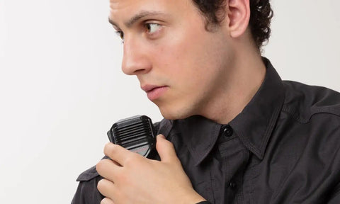 Person using Remote Speaker Microphone For Harris XL45 XL95 XG15 XG25 XG75 Radios With Noise Cancelling Microphone