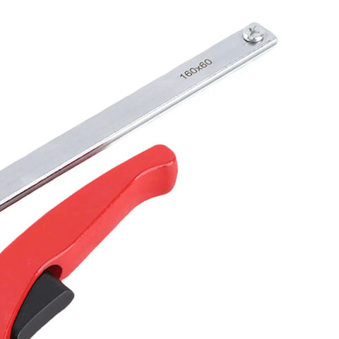 Close-up of Heavy Duty Ratchet Hold Down Clamp For 20mm Dog Holes showing guide rail and red handle.