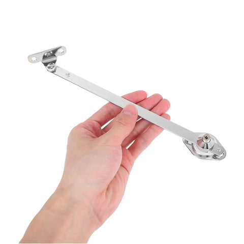 Hand holding Heavy Duty Lid Stay Hinges Twin Pack With Soft Down And Slow Open Door Action for cabinets in silver.