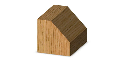 Wood block with 45-degree beveled edge cut using Pro Grade Carbide Chamfer Router Bit 45 Degree Bevel With Five Eighths Inch Cutting Length
