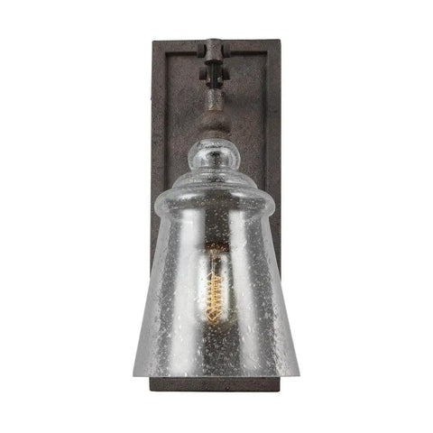 Loras One Light Wall Sconce In Traditional Style With Weathered Iron Finish, clear glass shade, E26 socket, classic rustic glow