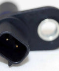 OEM Camshaft Position Sensor Replacement For Smooth Engine Timing, Plug In Drop In Sensor, Factory Quality Part For Reliable Start Up And Peak Performance, Easy Install, Compatible With Many Vehicles. Black plastic camshaft sensor with mounting eyelet