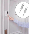 Person using 4-Piece Doorbell Key Tool Kit For Easy Battery Swaps And Mount Removal on Nest video doorbell