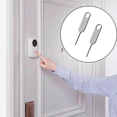 Person using 4-Piece Doorbell Key Tool Kit For Easy Battery Swaps And Mount Removal on Nest video doorbell