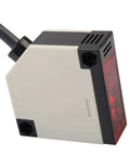 Close-up of Invisible Retro Reflective Photoelectric Beam Sensor for garage doors and gates, featuring high-tech design and 6-ft cable.