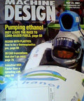 Book: Machine Design magazine cover featuring a race car driver wearing a blue helmet.
