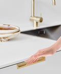 User demonstrating Concealed Drawer Pull Handle Black Zinc Alloy Slick Low Profile Cabinet Door Knob For Kitchen Cupboards And Drawers