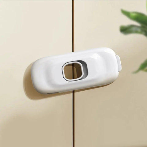 4 Pack Babyproof Cabinet Locks For Cabinets Drawers And Fridges Adjustable Length Easy Install White ABS Safety Locks For Kitchen Wardrobe And Freezer Keep Little Hands Safe No Tools Required white ABS lock on cabinet door.