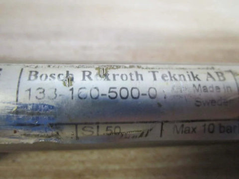 Close-up of Bosch Rexroth Teknik AB label on Industrial Hydraulic Cylinder 10mm Bore With Two And One Half Inches Stroke PN 13316050001.