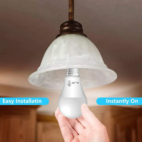 Hand installing A19 LED Light Bulbs 6 Pack 14W 100W Equivalent 1600 Lumens Daylight 5000K Non Dimmable E26 Base UL Listed