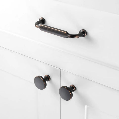 Give Your Cabinets A Serious Glow Up With These Heavy Duty 3 Inch Pulls In Smooth Oil Rubbed Bronze on white cabinets.