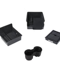 4 Piece Center Console Organizer And Cup Holder Insert for Tesla Model 3/Model Y shown detached, flocked rubber material visible.