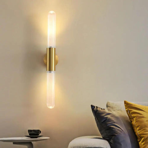 Wall Sconce Lights Indoor Bedroom Hallway GU10 2- Modern Long Brushed Middle Ages Brass Linear Clear Glass Copper Mount Lamp for Bedside Study Children's Room Bathroom mounted beside a cozy sofa.
