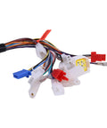 Close-up of motorcycle controller wiring harness with white connectors and multicolor wires