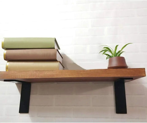 Heavy Duty Black L Shaped Wall Mount Shelf Brackets Right Angle Corner Support With Screws For Kitchen Storage And DIY Shelving Super Sturdy Worth Every Penny Pack Of Two holding books and a plant on a brown wooden shelf.