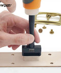 Oblong Leather Hole Punch Set With 19 Sizes And Nylon Pad in use on leather, showing precise hole punching with tools and fasteners.