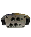 A-11215 mechanical shift valve manifold with pilot valve; metal block with four circular ports
