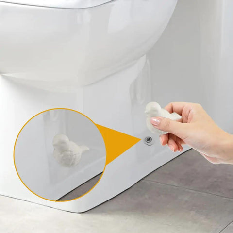Slick White Ceramic Bird Toilet Bolt Covers Hiding Exposed Flange Nuts Zero Stress Install on toilet base for easy decor upgrade.