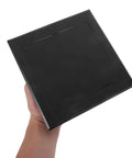 Slick Black Plastic Wall Access Panel Swings Open For Easy Inspections held in hand, showcasing smooth finish and quick snap design.