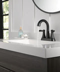 Modern bathroom vanity with Esato Centerset Chrome Bathroom Faucet With Drain Assembly Included and black handle design