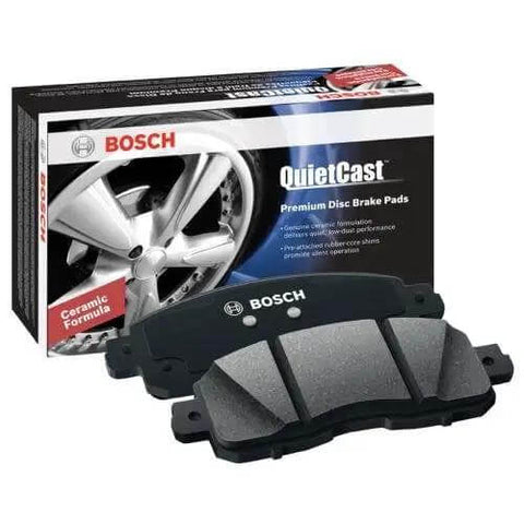 QuietCast Premium Ceramic Disc Brake Pad Set Front For Select Audi A3 And TT And Volkswagen Beetle CC Eos Golf GTI Jetta Passat Rabbit Plus More With Quiet Stops And Strong Durability, shown with packaging