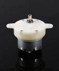 12V Tiny Gearbox DC Motor With 3 RPM Slow Speed High Torque 4mm Shaft Reversible Low Noise For Displays on black background