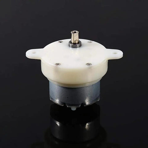 12V Tiny Gearbox DC Motor With 3 RPM Slow Speed High Torque 4mm Shaft Reversible Low Noise For Displays on black background