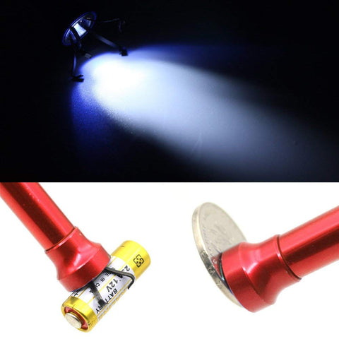 Powerful 20 Lb Telescoping Magnetic Pickup Tool with LED light and four claw grabber picking up objects