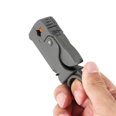 Hand holding coax cable stripping tool from the Coax Cable Crimping Tool Kit With Stripper And Universal Compression Tool Includes 5 RG6 F Type Connectors.