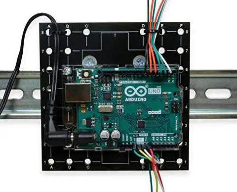Rack Ready DIN Rail Universal Mounting Plate 4 Inch By 6 Inch With 68 Pre Drilled Holes Clips Onto 35 mm Rail Steel Bracket RoHS Compliant Industrial Mounting Platform For Devices with an electronic board attached.